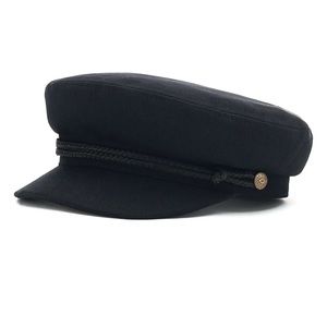 Brixton fiddler fisherman cap. Worn a few times but was small.